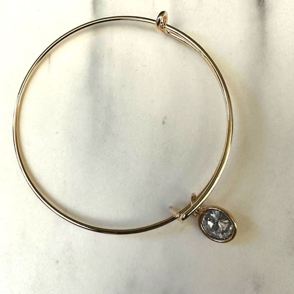 Goldย tone adjustable braceletโwith rhinestoneโcharm